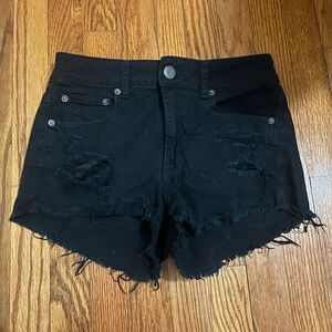 Size 4 black shorts with some rips.